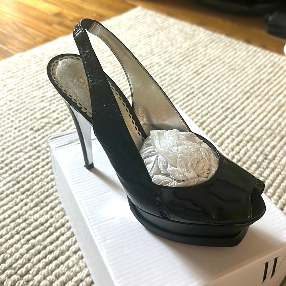 Gently used Black patent leather Bebe platform heels size 6
